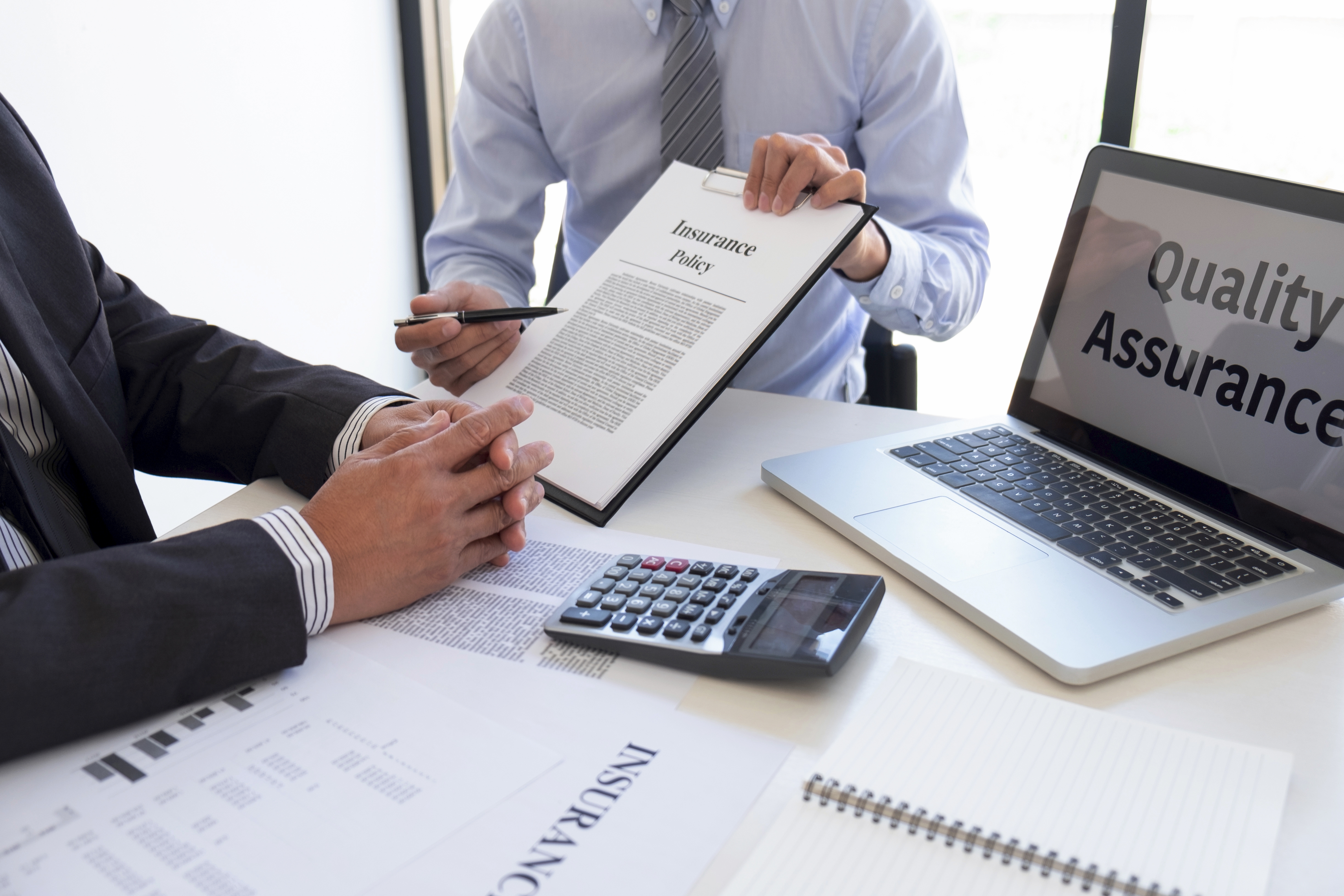 Agent man presentation and consulting life insurance detail to customer and waiting for his reply